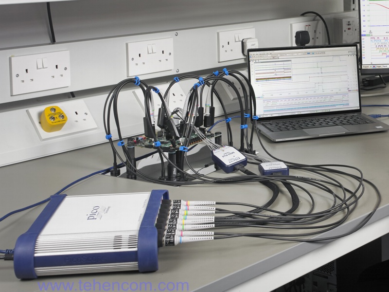 Pico Technology PQ219 kit, designed to securely hold the PCB under test, eight analog probes and two digital probes